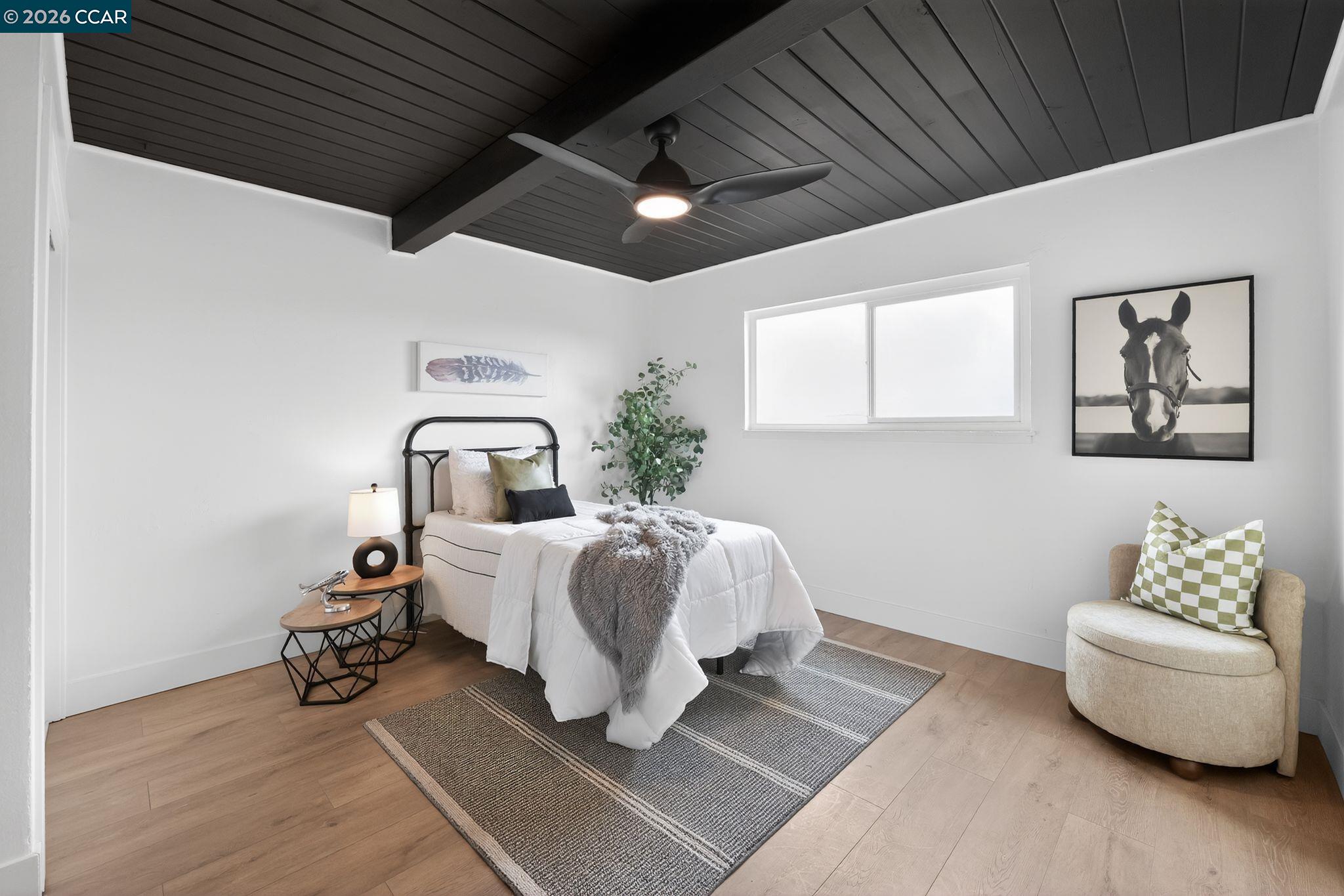 1838 Overhill Road Concord, CA 94520 - Photo 22 of 25 a room with a bed and a couch