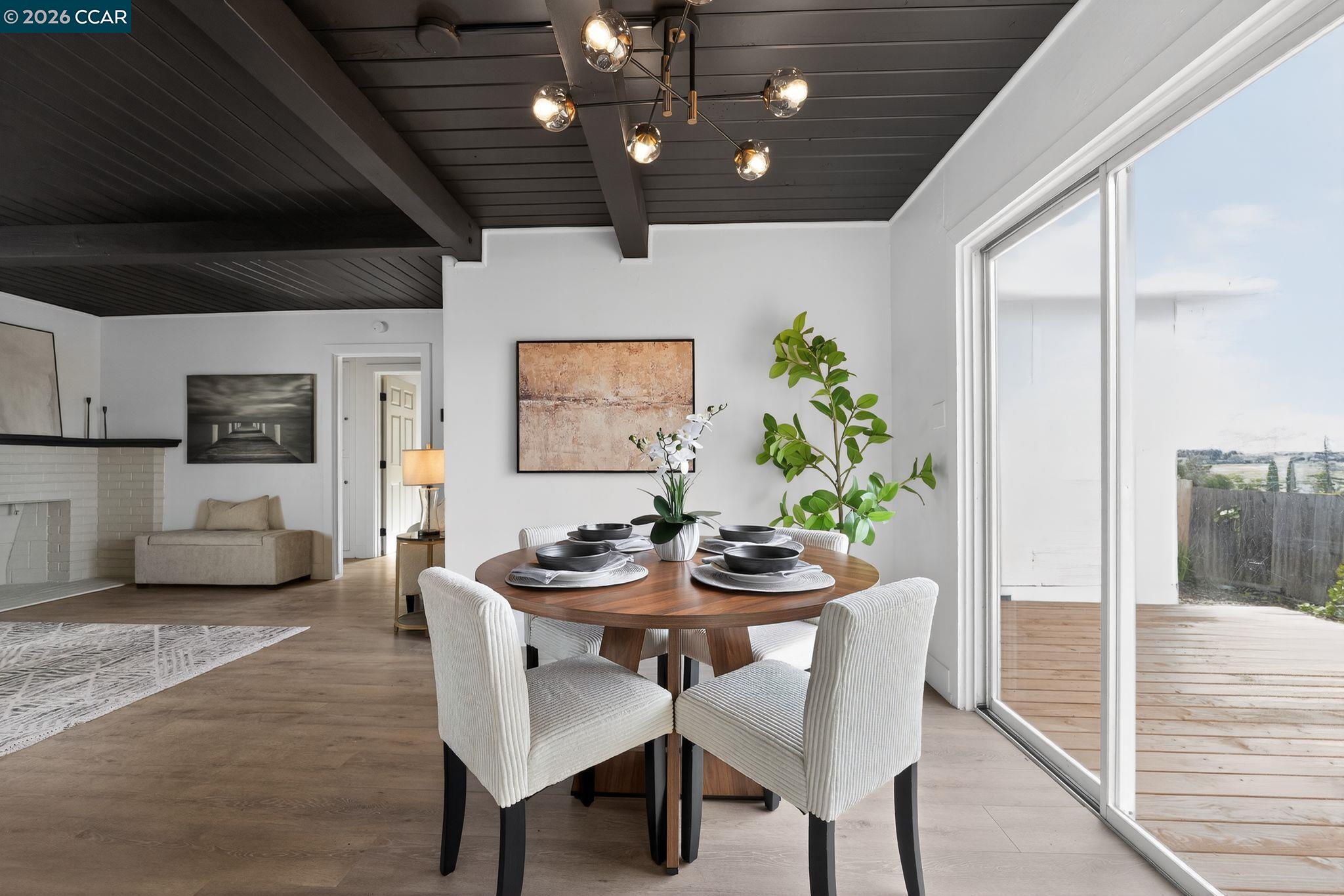 1838 Overhill Road Concord, CA 94520 - Photo 10 of 25 a dining room with furniture and window