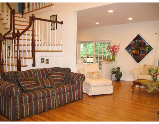 43 Newbrook Circle Newton, MA 02467 - Photo 3 of 14 a living room with furniture window and a flat screen tv