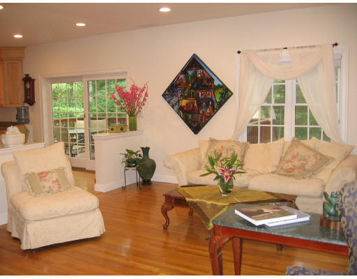 43 Newbrook Circle Newton, MA 02467 - Photo 7 of 14 a living room with furniture and a window