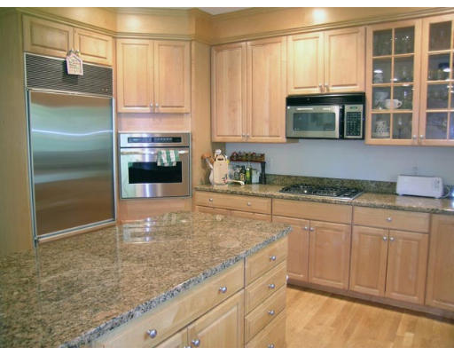 43 Newbrook Circle Newton, MA 02467 - Photo 9 of 14 a kitchen with stainless steel appliances granite countertop a refrigerator and a sink