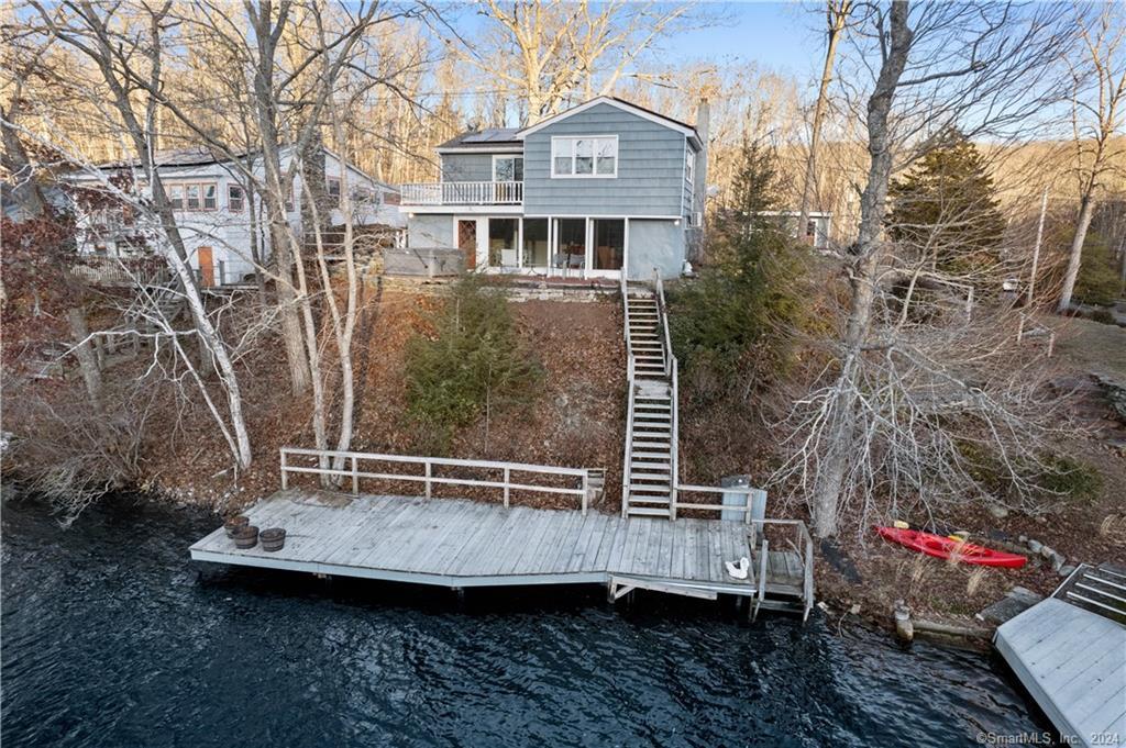 649 Lantern Hill Road North Stonington, CT 06359 - Photo 1 of 1 a view of a house with backyard