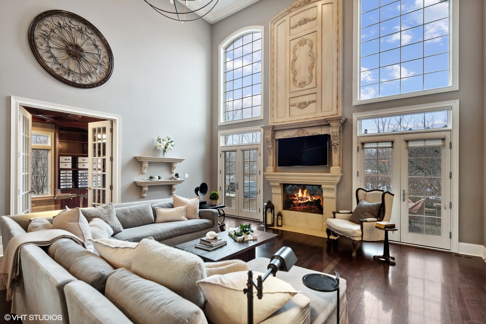 3825 Oak Avenue Northbrook, IL 60062 - Photo 16 of 56 a living room with furniture a fireplace and a flat screen tv