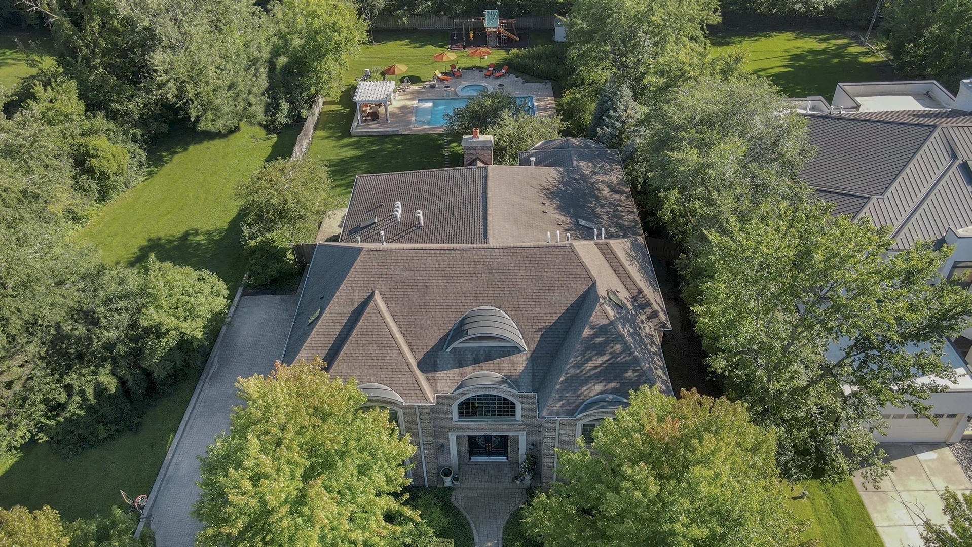 3825 Oak Avenue Northbrook, IL 60062 - Photo 2 of 56 an aerial view of a house with a garden