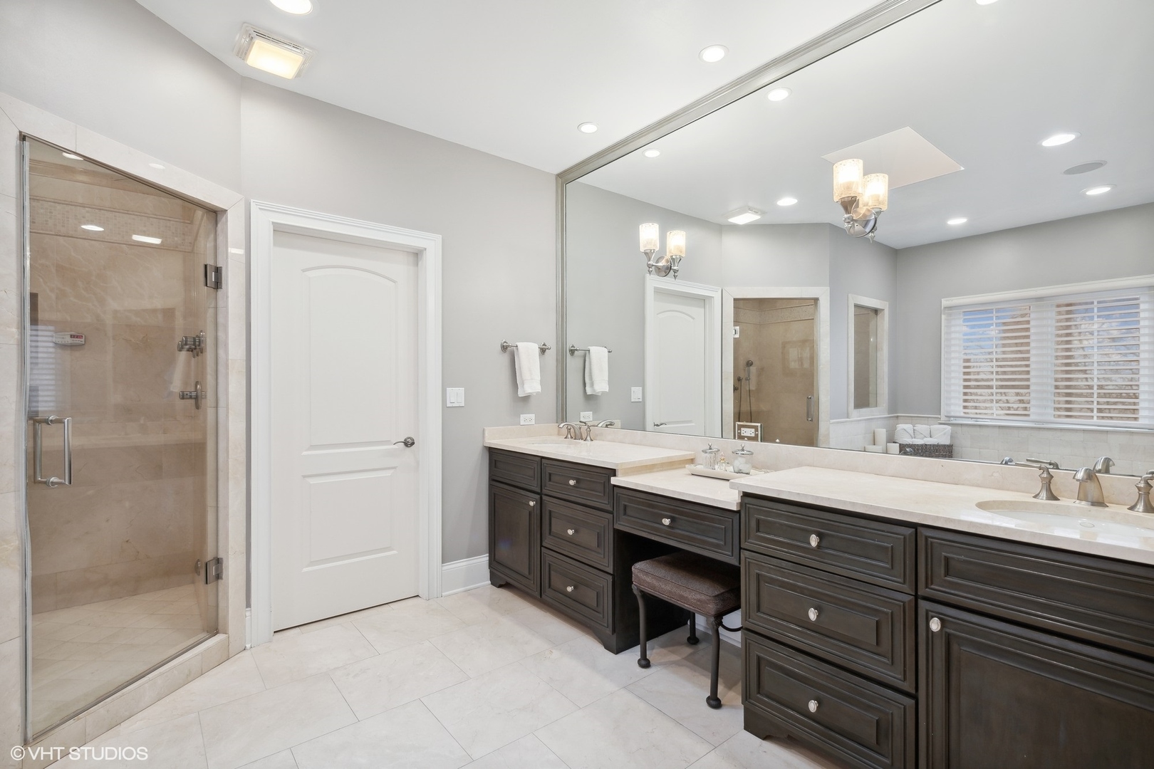 3825 Oak Avenue Northbrook, IL 60062 - Photo 23 of 56 a bathroom with a granite countertop sink mirror and shower