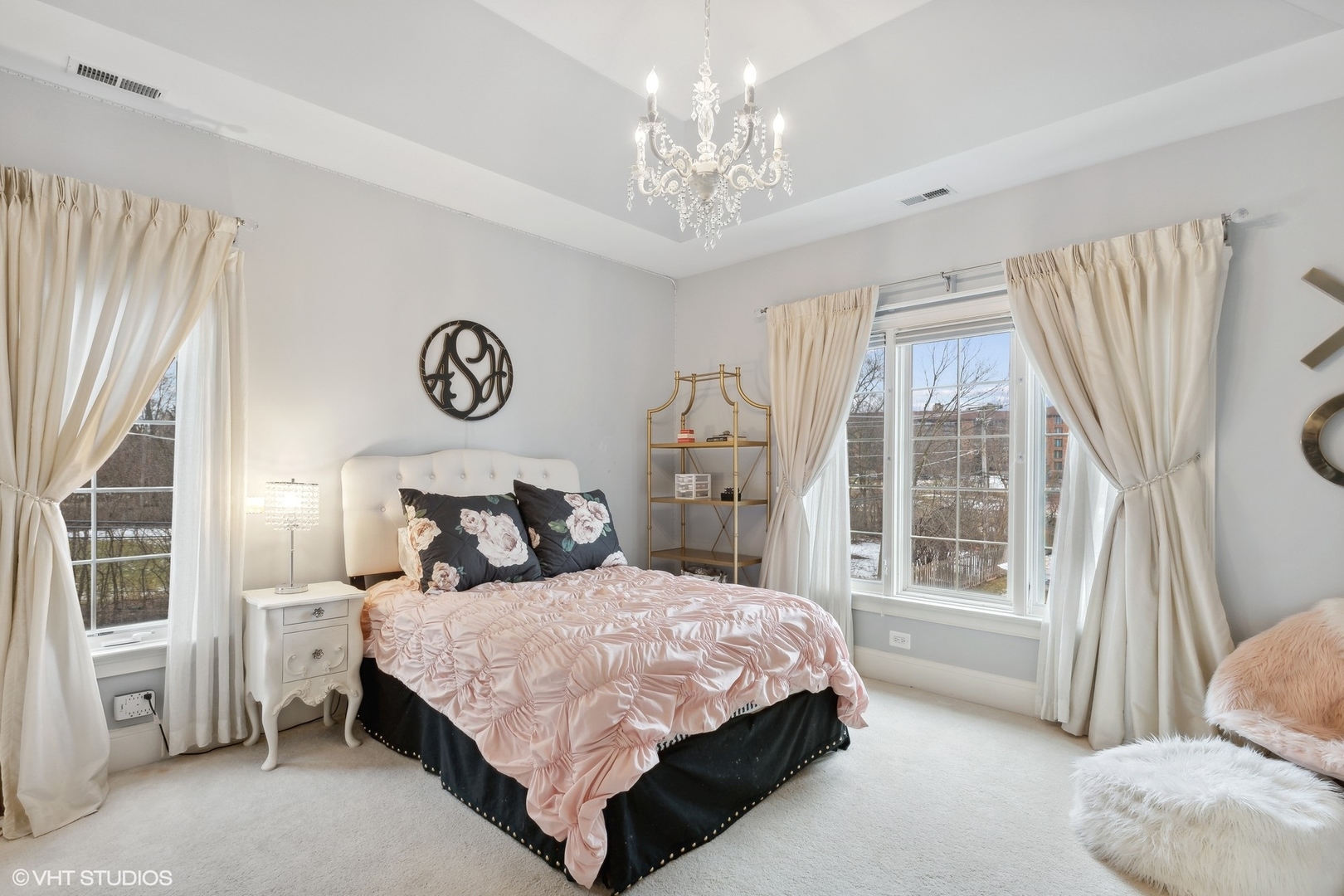 3825 Oak Avenue Northbrook, IL 60062 - Photo 27 of 56 a bedroom with a large bed and a chandelier