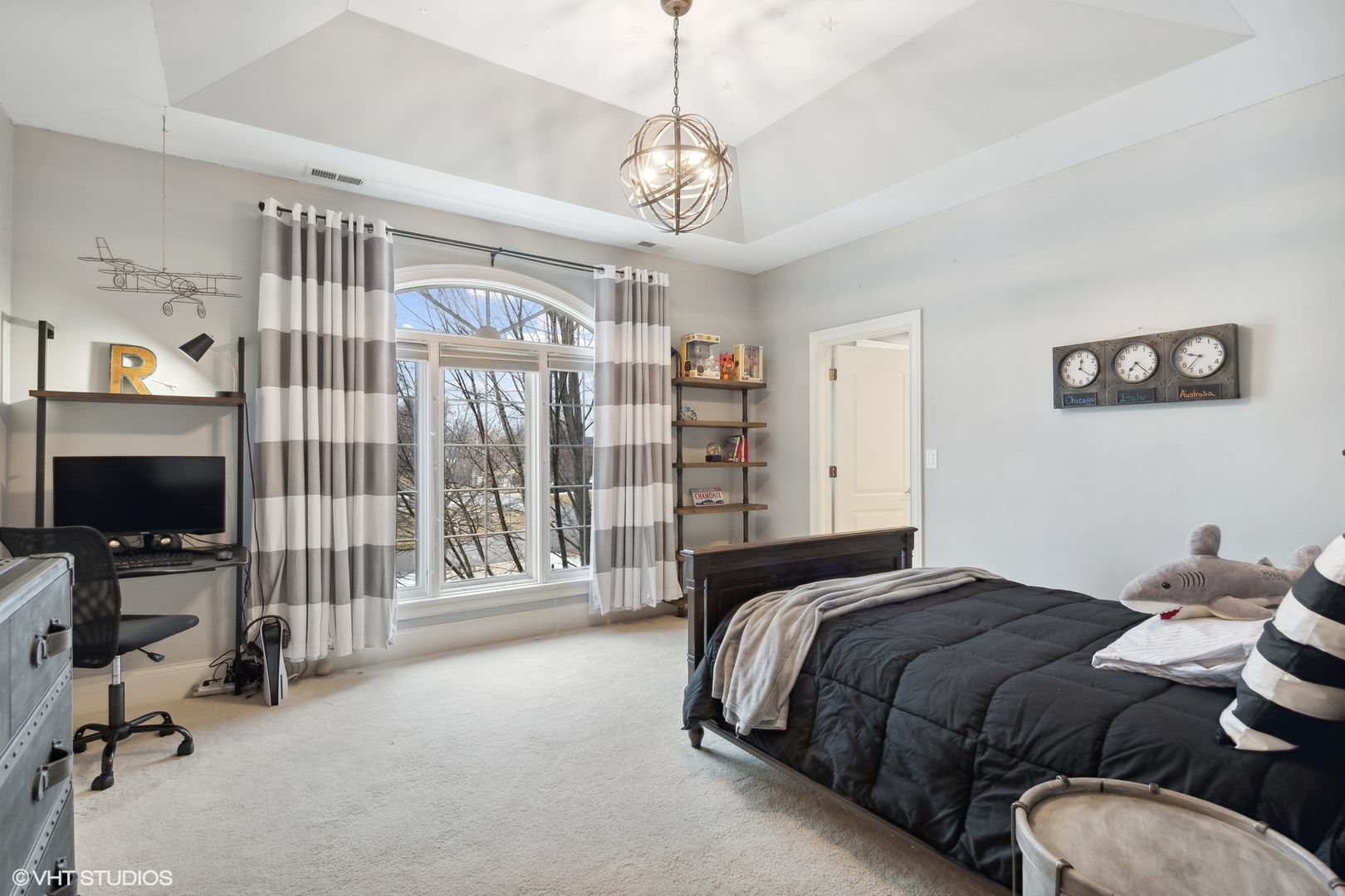 3825 Oak Avenue Northbrook, IL 60062 - Photo 29 of 56 a bedroom with bed tv and a large window