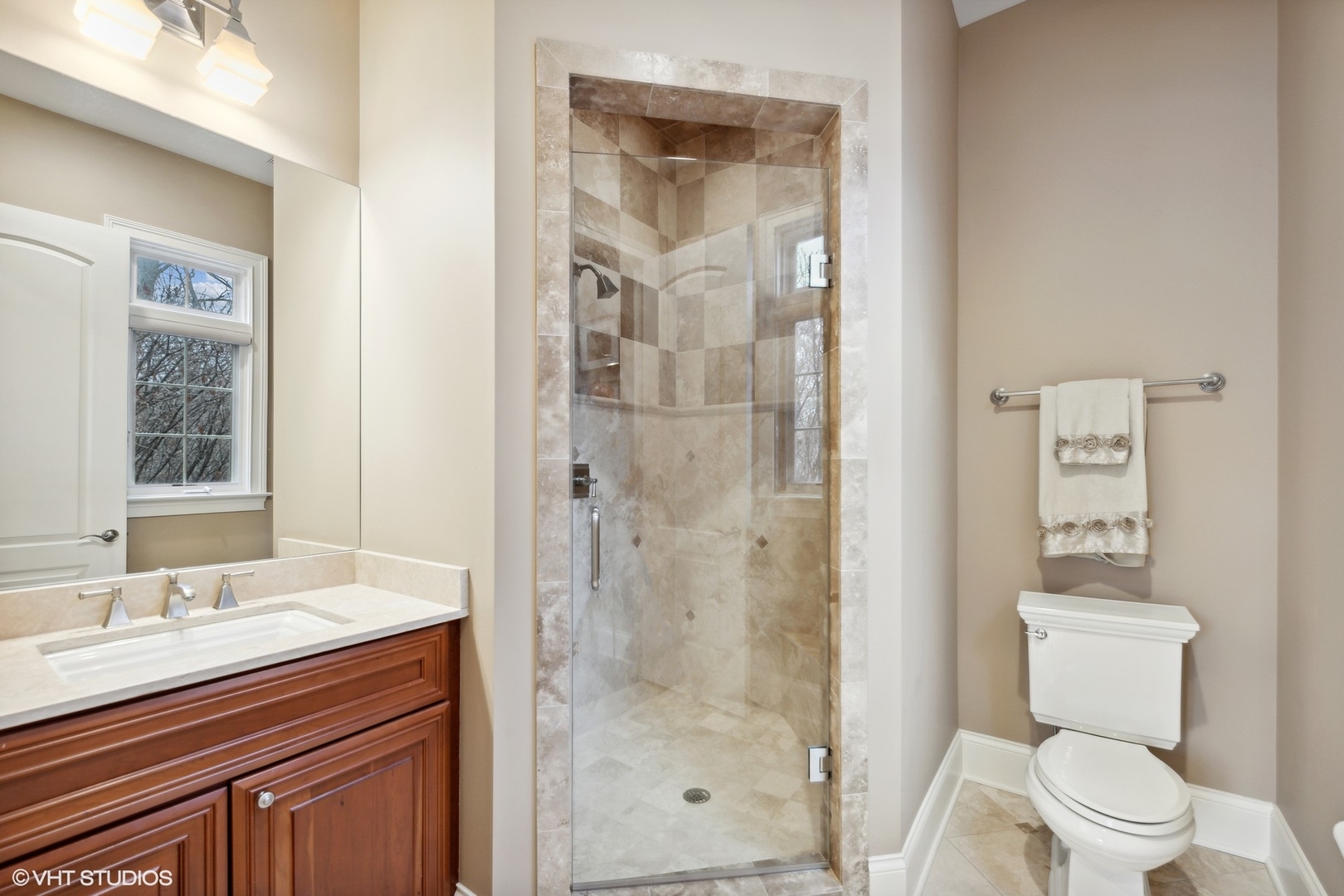 3825 Oak Avenue Northbrook, IL 60062 - Photo 32 of 56 a bathroom with a granite countertop sink toilet and shower