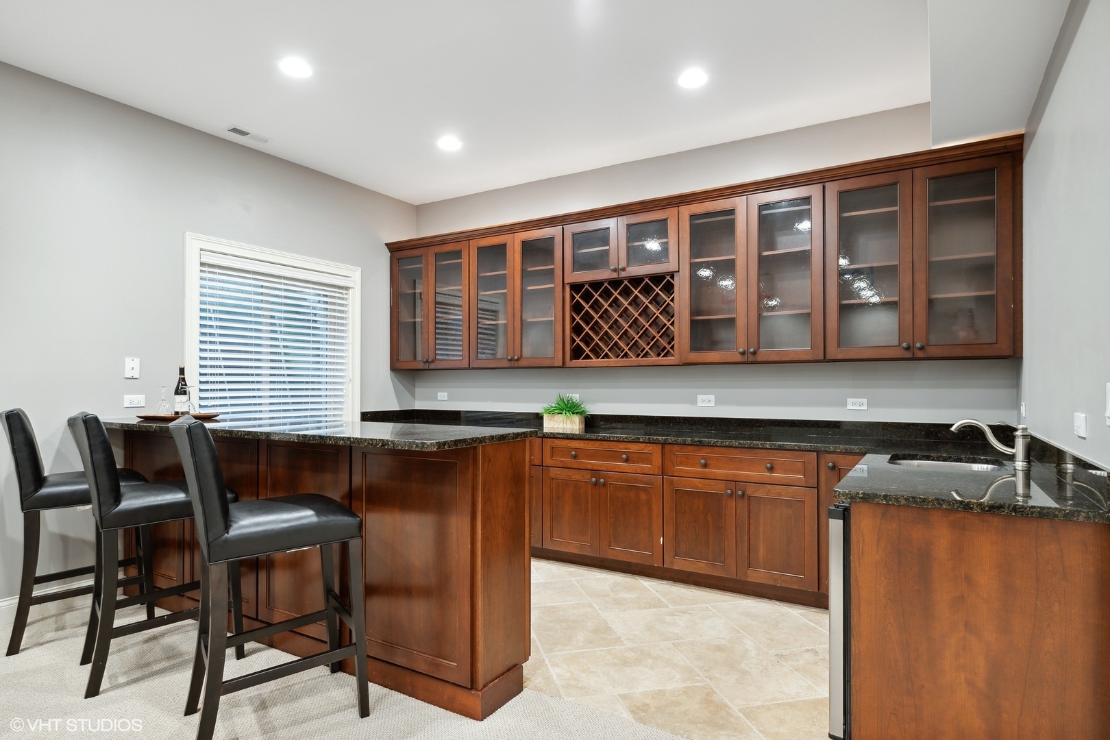 3825 Oak Avenue Northbrook, IL 60062 - Photo 34 of 56 a kitchen with stainless steel appliances granite countertop sink cabinets and window