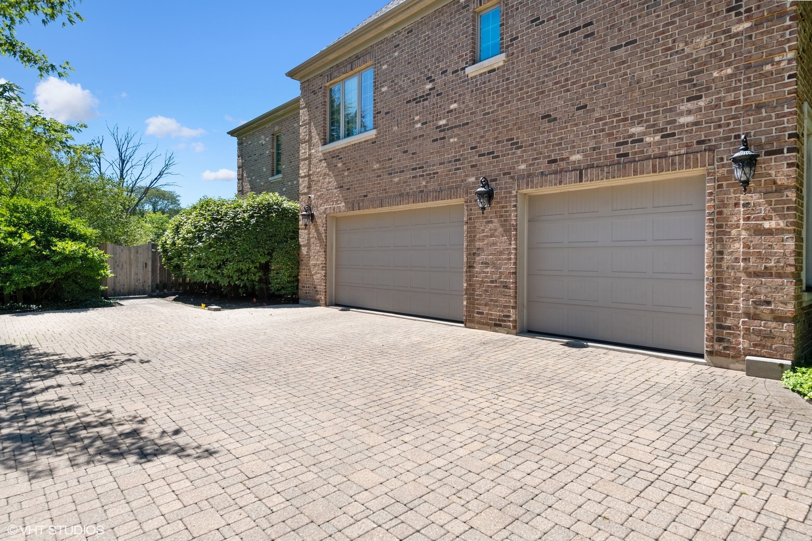 3825 Oak Avenue Northbrook, IL 60062 - Photo 56 of 56 a front view of a house with a yard and garage