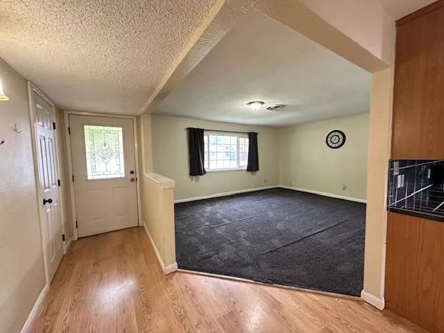 a view of an empty room and window