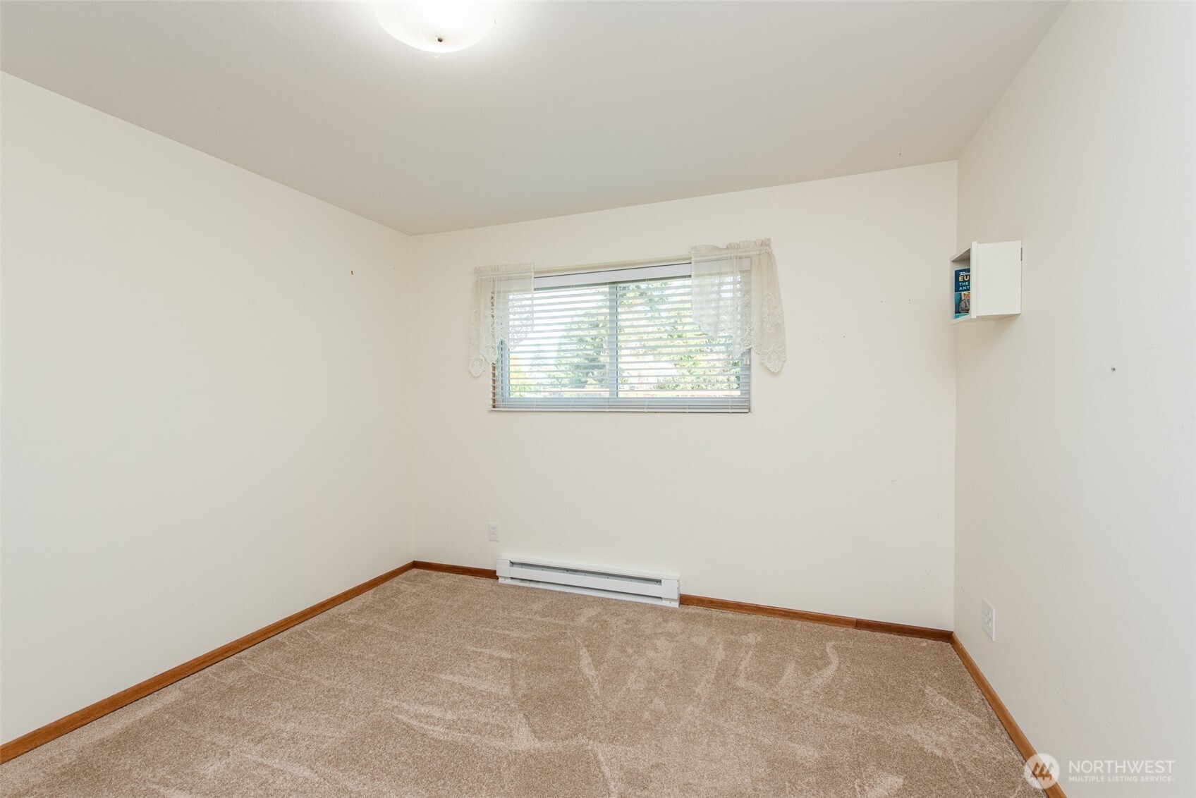 307 East Fir Street Sequim, WA 98382 - Photo 16 of 29 an empty room with a window