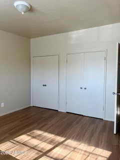 a view of a balcony with an ocean