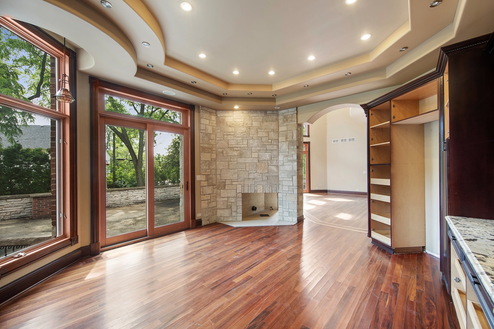 819 Wilson Lane Hinsdale, IL 60521 - Photo 11 of 26 a view of empty room with wooden floor and fan