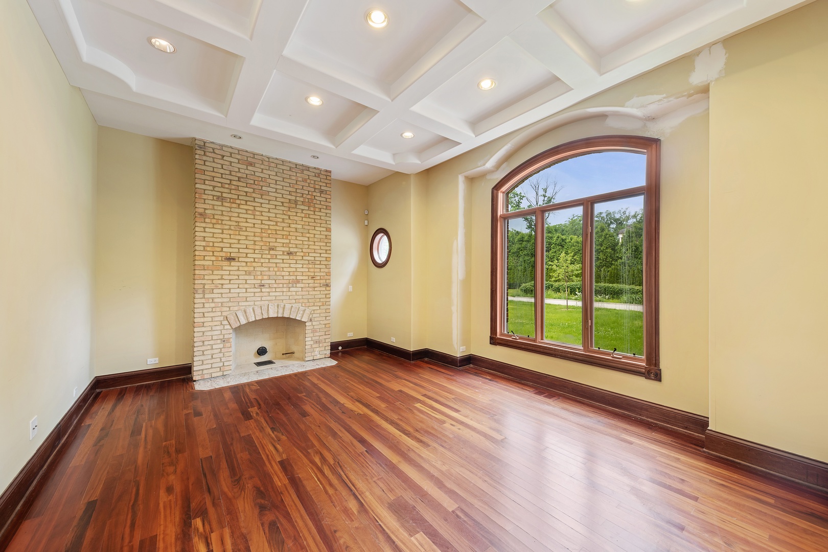 819 Wilson Lane Hinsdale, IL 60521 - Photo 12 of 26 wooden floor in an empty room with a window