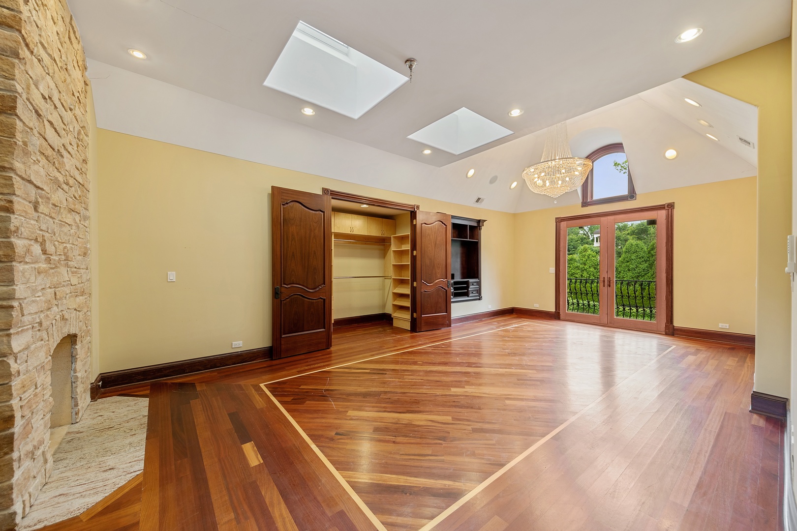 819 Wilson Lane Hinsdale, IL 60521 - Photo 16 of 26 a view of an empty room with wooden floor and a window