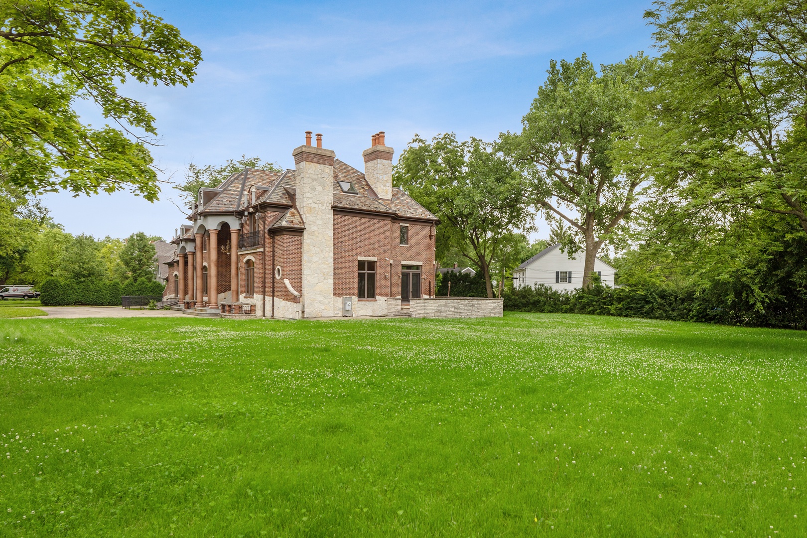 819 Wilson Lane Hinsdale, IL 60521 - Photo 24 of 26 a view of a house with a backyard