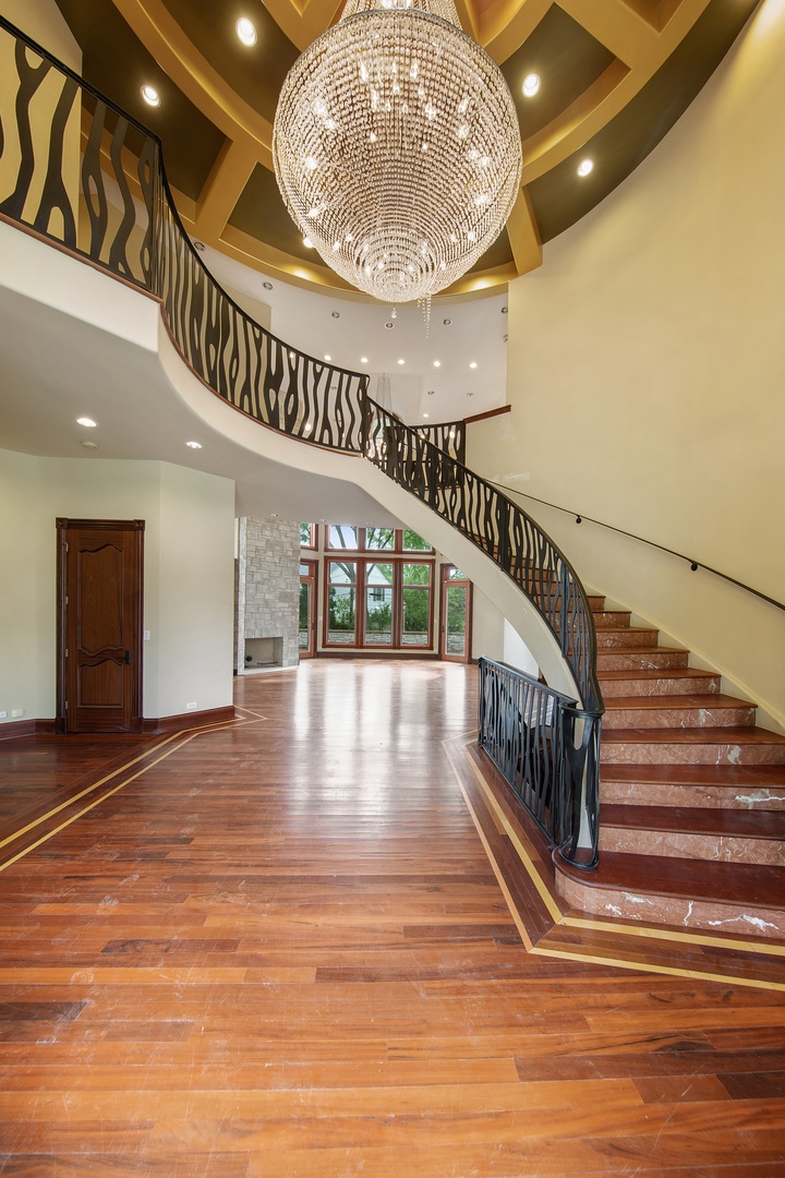 819 Wilson Lane Hinsdale, IL 60521 - Photo 4 of 26 a view of entryway and hall with wooden floor