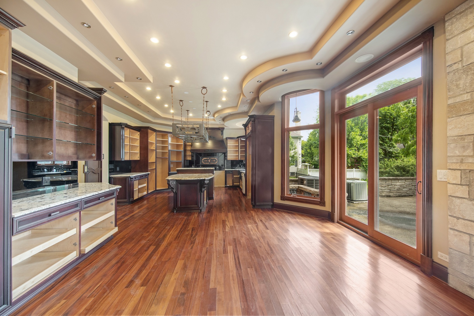 819 Wilson Lane Hinsdale, IL 60521 - Photo 10 of 26 a living room with furniture a wooden floor and a large window