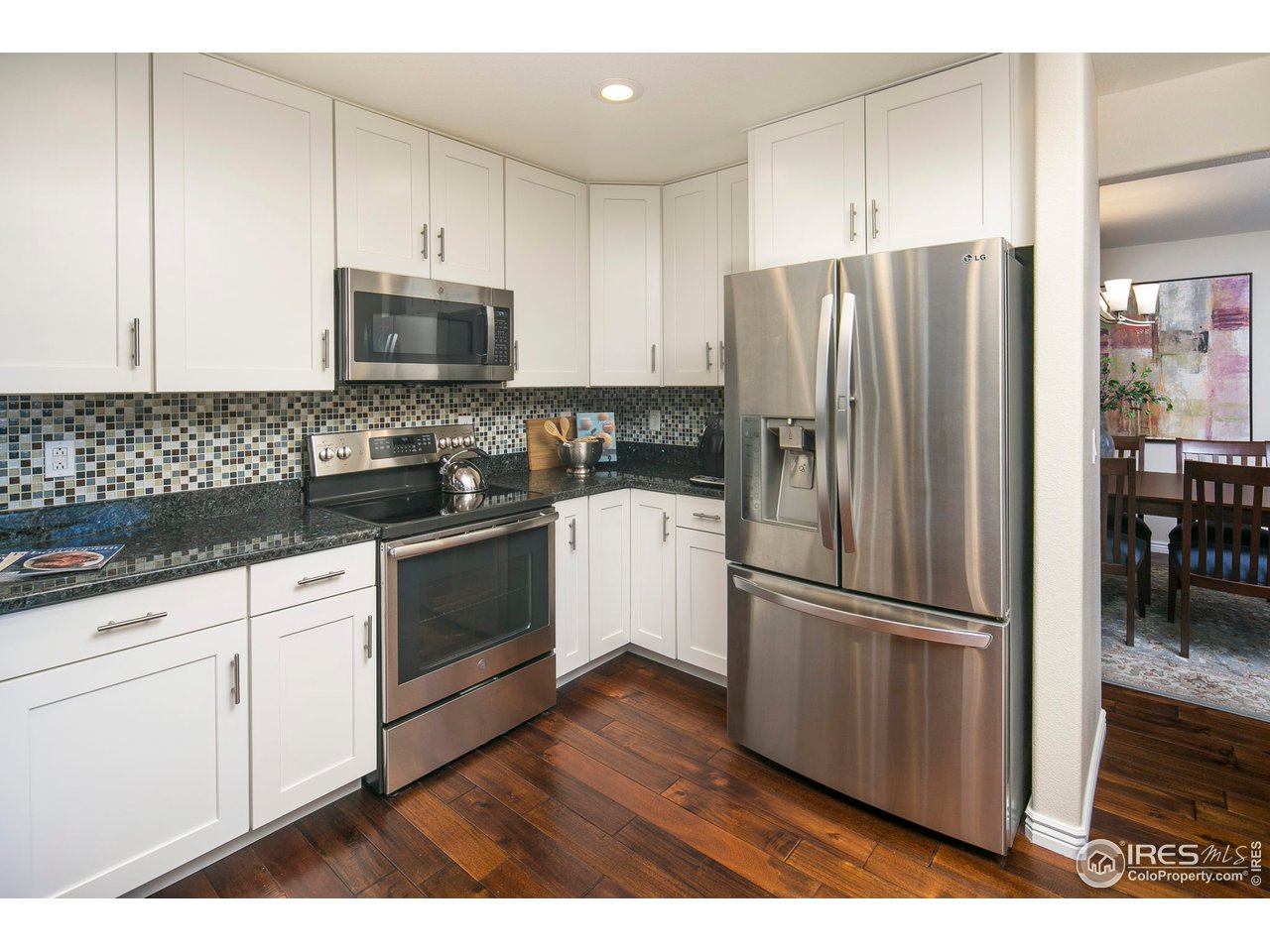 1692 Eldorado Drive Superior, CO 80027 - Photo 11 of 34 a kitchen with stainless steel appliances a refrigerator sink and microwave