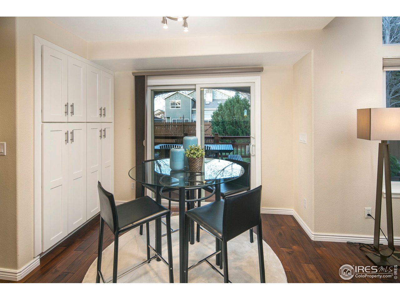 1692 Eldorado Drive Superior, CO 80027 - Photo 12 of 34 a view of a dining room with furniture window and wooden floor