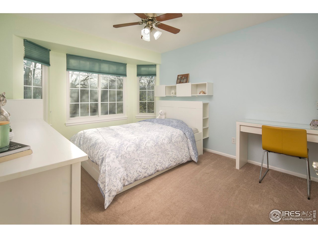 1692 Eldorado Drive Superior, CO 80027 - Photo 20 of 34 a bedroom with a bed and a desk