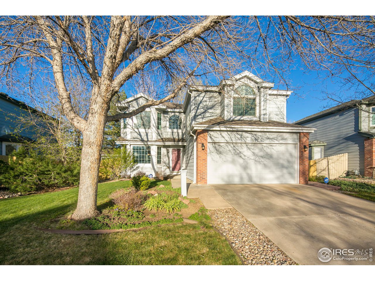 1692 Eldorado Drive Superior, CO 80027 - Photo 2 of 34 a view of a house with a yard