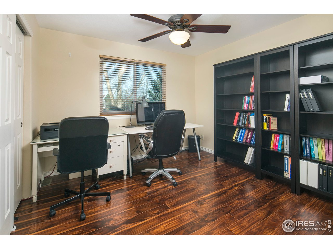 1692 Eldorado Drive Superior, CO 80027 - Photo 22 of 34 a workspace with furniture window and wooden floor