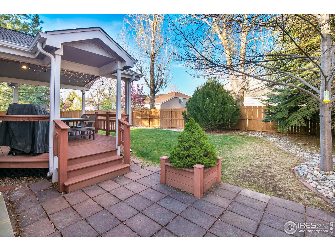 1692 Eldorado Drive Superior, CO 80027 - Photo 32 of 34 a view of a patio with a table and chairs