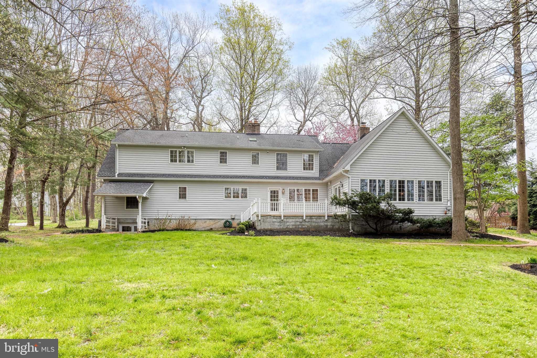 1216 Bonaire Road Forest Hill, MD 21050 - Photo 55 of 71 a view of a house with a big yard and large trees