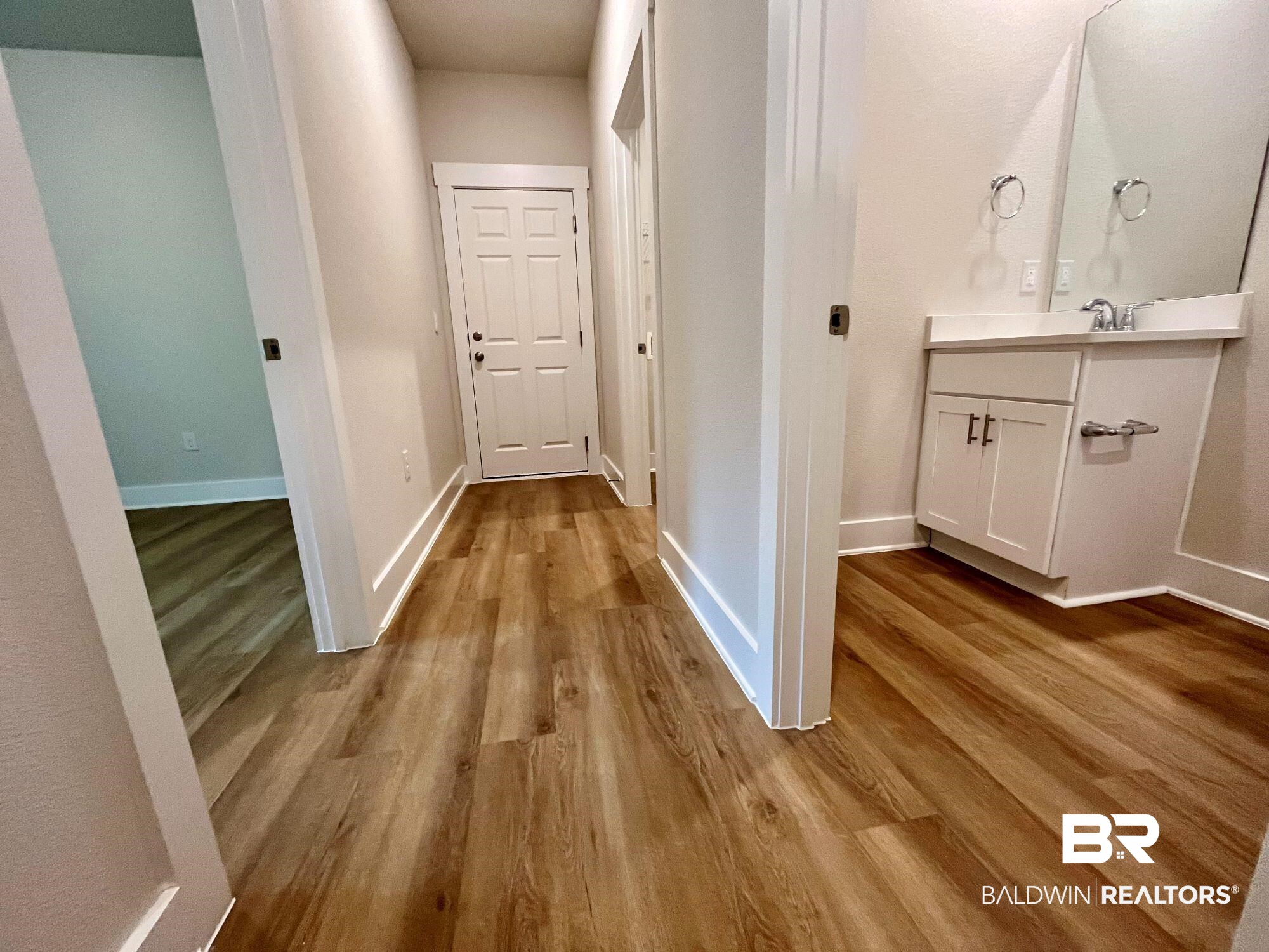 330 Barndling Street Fairhope, AL 36532 - Photo 21 of 31 Corridor featuring light wood-type flooring