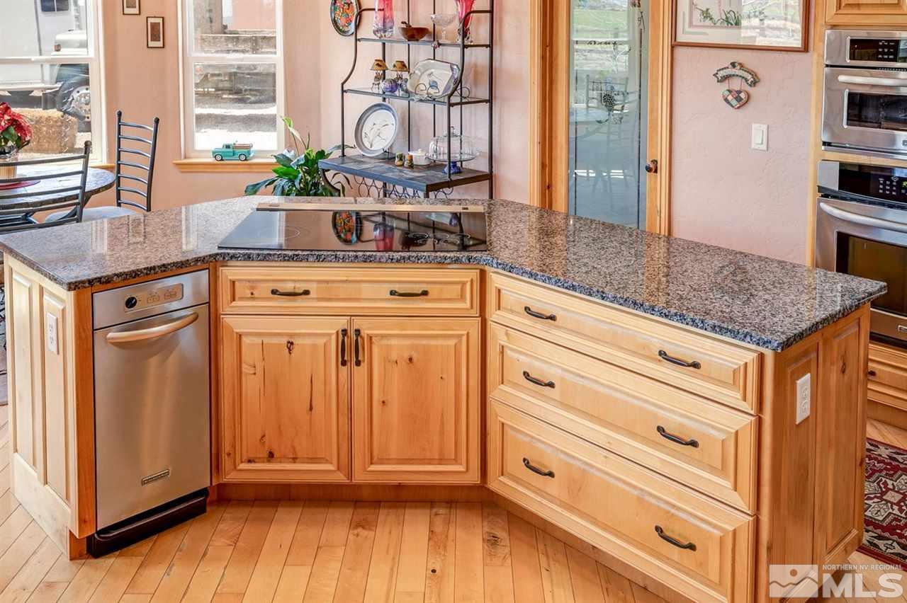 3500 South Allen Road Fallon, NV 89406 - Photo 11 of 40 a kitchen with stainless steel appliances granite countertop a sink and a cabinets