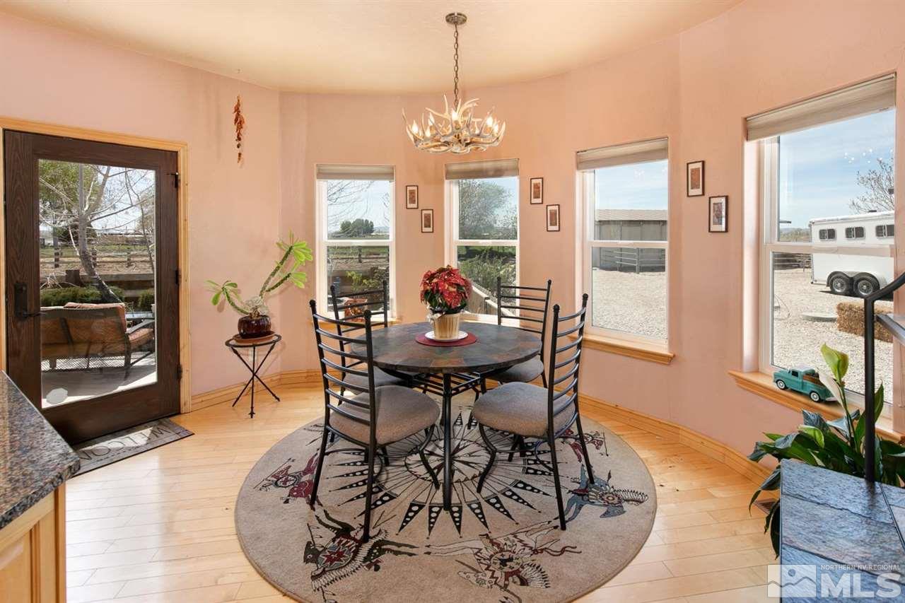 3500 South Allen Road Fallon, NV 89406 - Photo 12 of 40 a dining room with furniture window and wooden floor