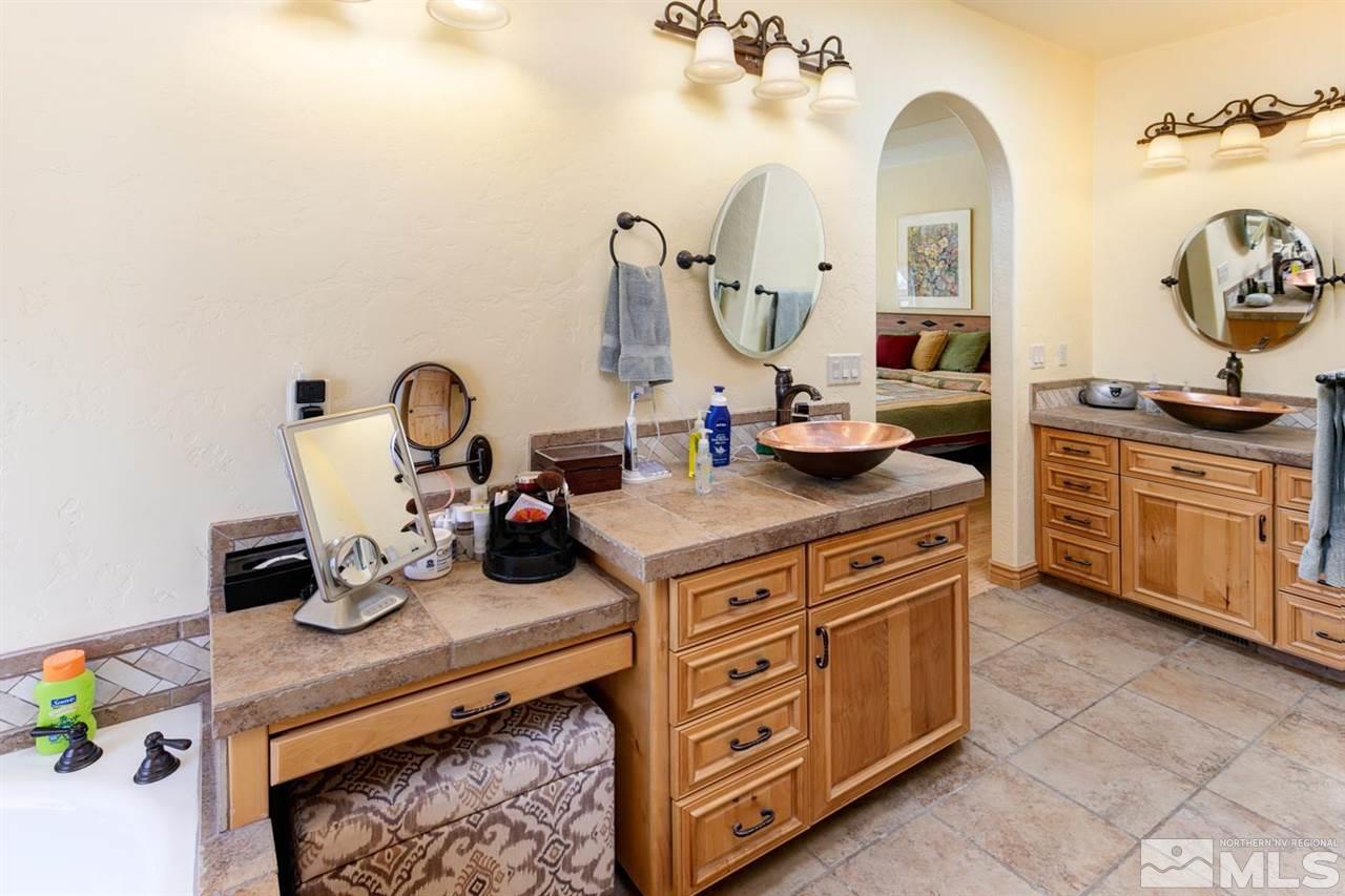 3500 South Allen Road Fallon, NV 89406 - Photo 25 of 40 a view of living room with stove and cabinets