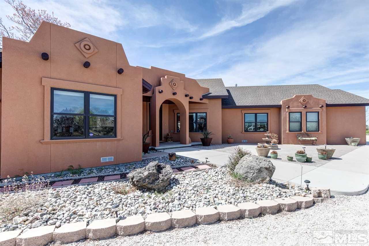 3500 South Allen Road Fallon, NV 89406 - Photo 3 of 40 a bedroom with a bed and a window