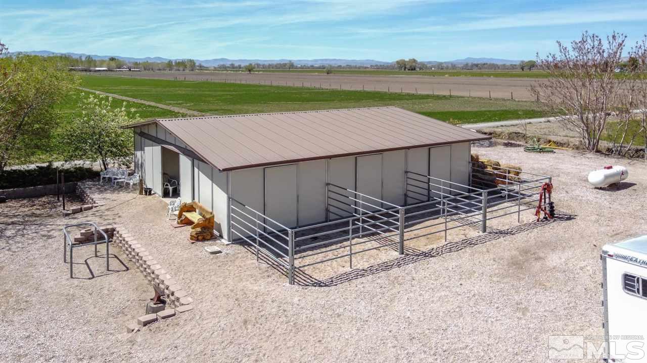 3500 South Allen Road Fallon, NV 89406 - Photo 38 of 40 a view of a terrace with a table and chairs