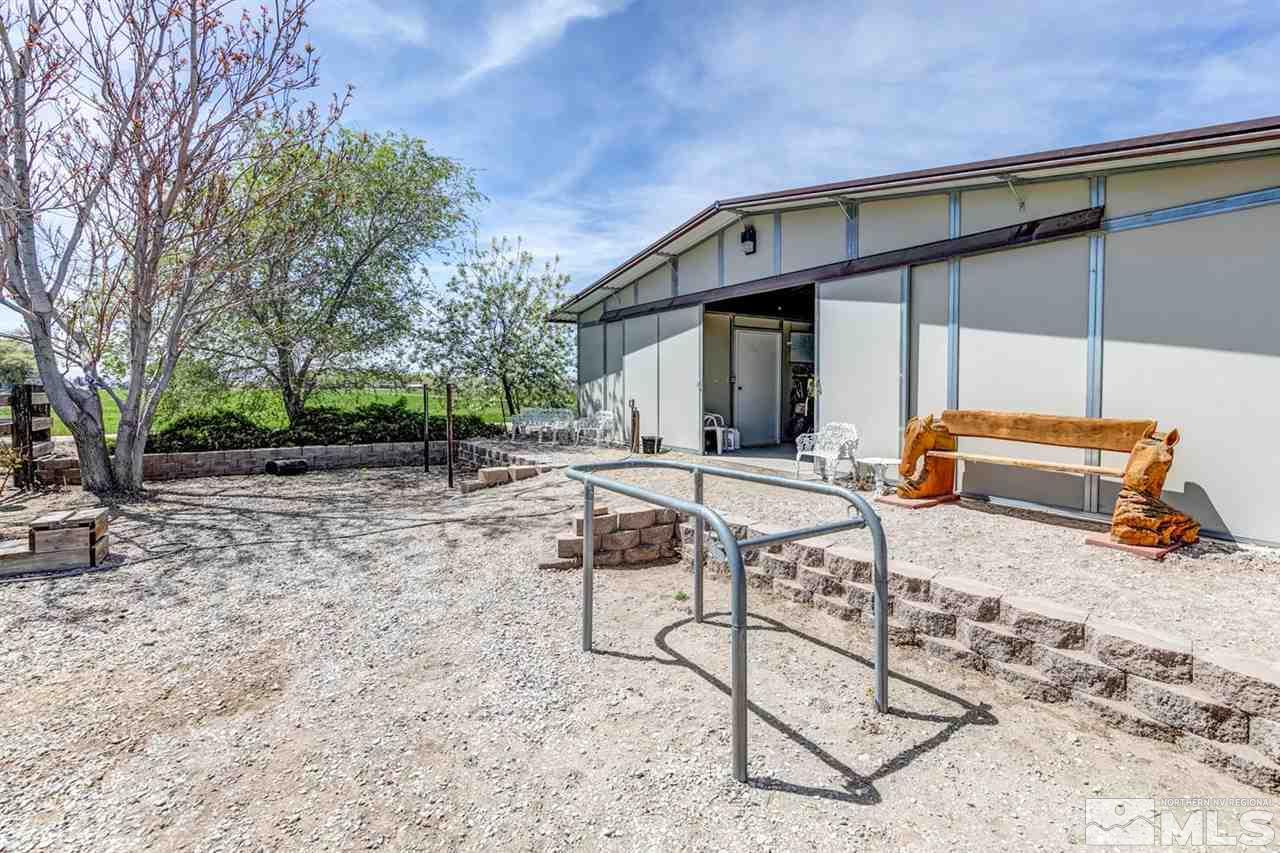 3500 South Allen Road Fallon, NV 89406 - Photo 39 of 40 a backyard of a house with table and chairs