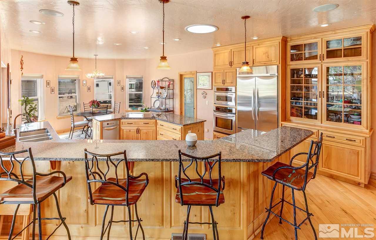 3500 South Allen Road Fallon, NV 89406 - Photo 7 of 40 a dining table tennis a glass table and chairs