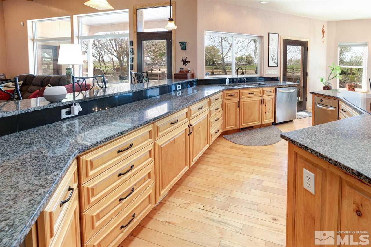 3500 South Allen Road Fallon, NV 89406 - Photo 10 of 40 a large kitchen with kitchen island granite countertop a large window