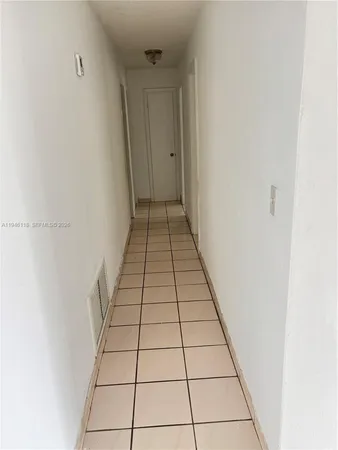 a view of a room and window