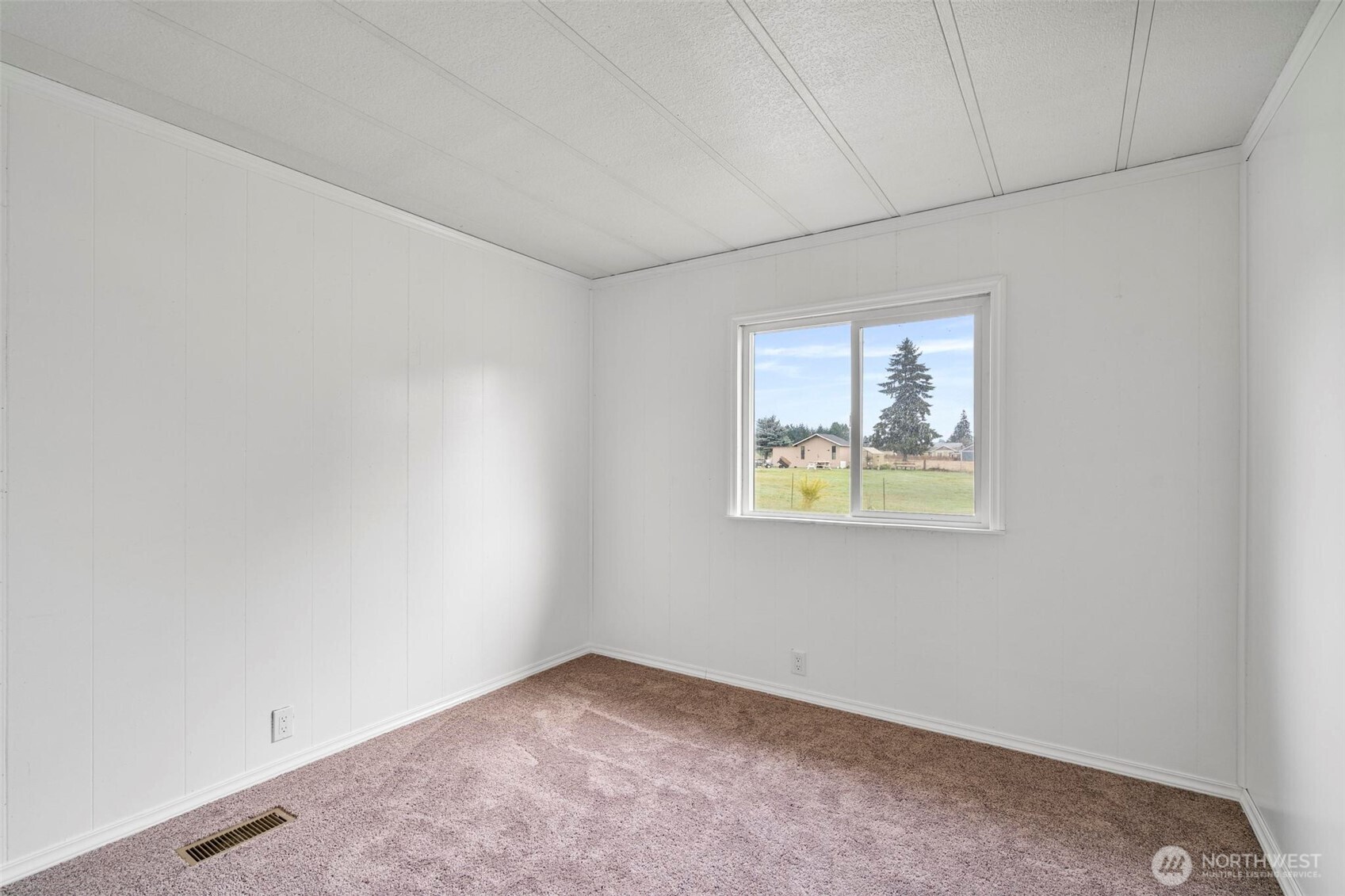 8826 183rd Avenue Southwest Rochester, WA 98579 - Photo 14 of 31 an empty room with windows