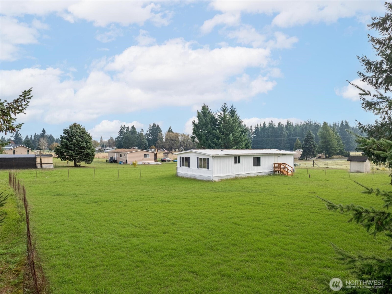 8826 183rd Avenue Southwest Rochester, WA 98579 - Photo 26 of 31 a house view with a garden space