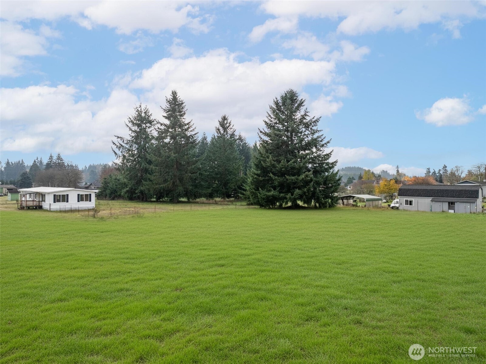 8826 183rd Avenue Southwest Rochester, WA 98579 - Photo 28 of 31 a front view of a house with a garden