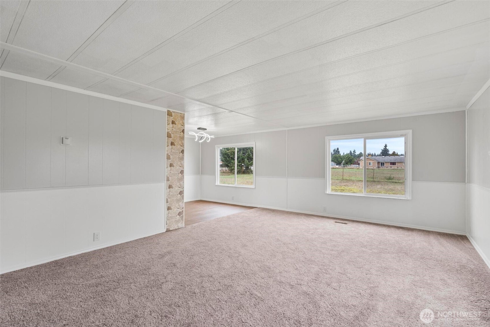 8826 183rd Avenue Southwest Rochester, WA 98579 - Photo 3 of 31 an empty room with a window