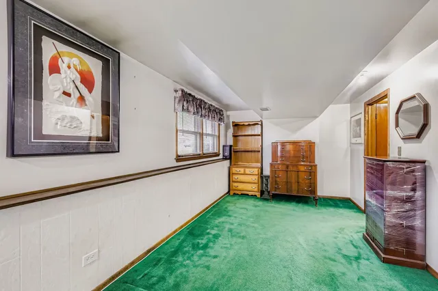 a view of an empty room with windows