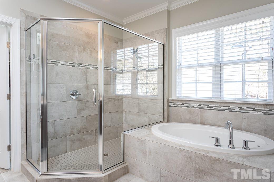4604 Pleasant Pointe Way Raleigh, NC 27613 - Photo 18 of 30 Soaking Tub and Expansive tile shower