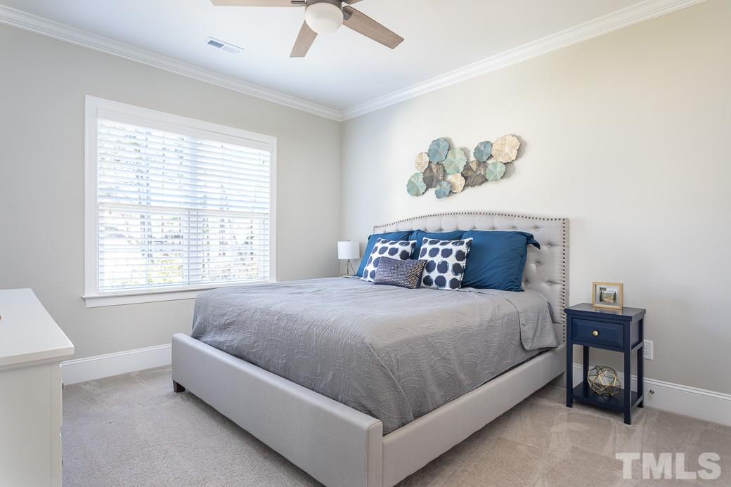 4604 Pleasant Pointe Way Raleigh, NC 27613 - Photo 22 of 30 Spacious bedroom with ceiling fan