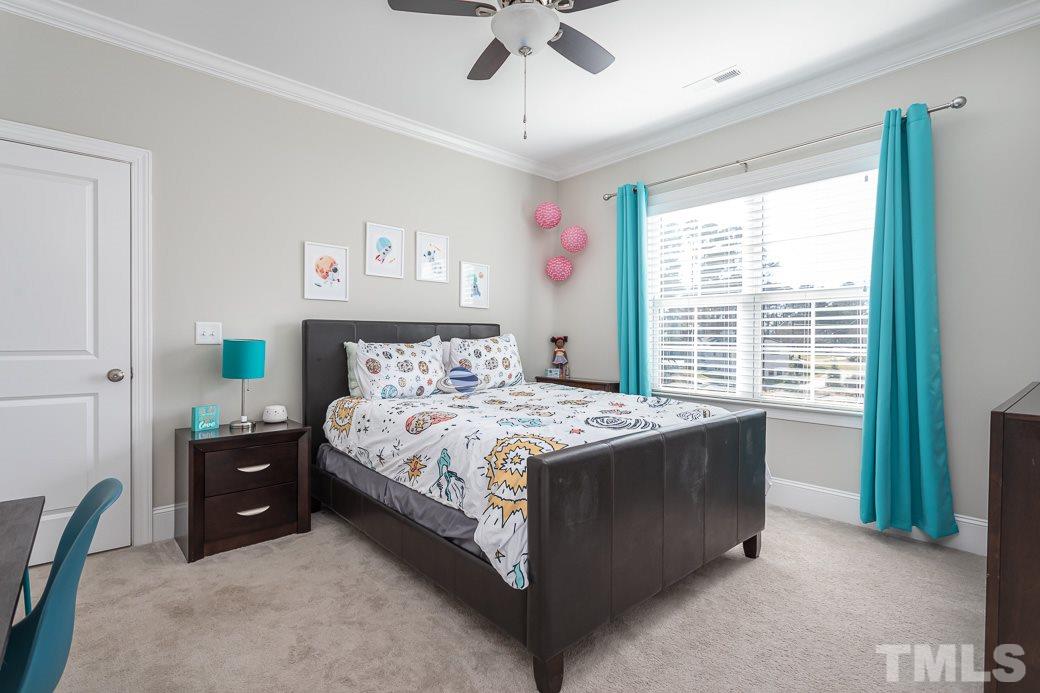 4604 Pleasant Pointe Way Raleigh, NC 27613 - Photo 27 of 30 Spacious bedroom with ensuite tile bath