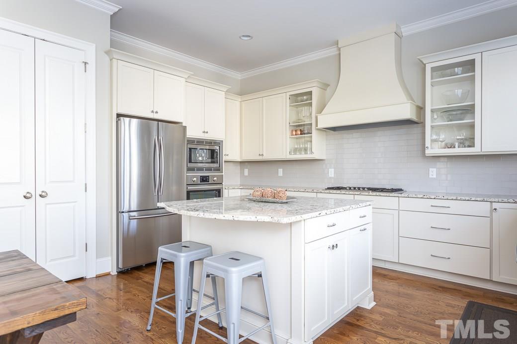 4604 Pleasant Pointe Way Raleigh, NC 27613 - Photo 10 of 30 Gourmet Kitchen with island and Bosch appliances