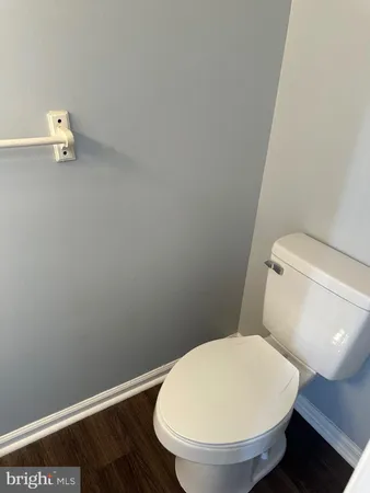 a bathroom with a toilet and a sink